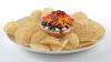 7 LAYER DIP WITH TOSTITOS® WHOLE GRAIN RICH CRISPY ROUND TORTILLA CHIPS