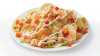 Buffalo Chicken Nachos with TOSTITOS® Whole Grain Rich Crispy Round Tortilla Chips