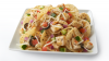 ITALIAN CHICKEN NACHOS WITH TOSTITOS® WHOLE GRAIN RICH CRISPY ROUND TORTILLA CHIPS