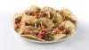 Mongolian Beef with Walking Taco TOSTITOS® Reduced Fat Crispy Round Tortilla Chip.jpg 